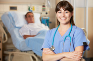 22871724-portrait-of-nurse-with-patient-in-background